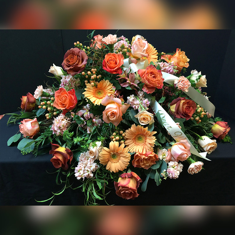 Love Blooms Casket Spray